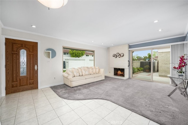 living area featuring crown molding, a brick fireplace, light carpet, and light tile patterned floors