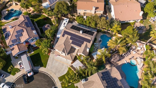 birds eye view of property with a residential view