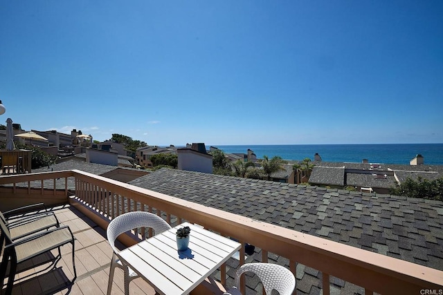 wooden terrace with a water view