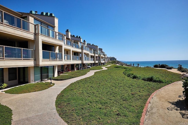 view of community featuring a water view