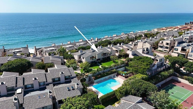 bird's eye view featuring a water view and a residential view