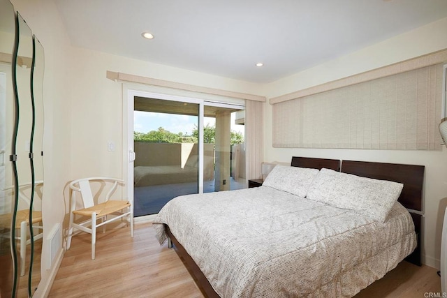 bedroom featuring recessed lighting, baseboards, access to exterior, and light wood-style flooring