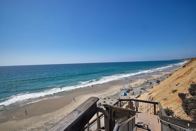 property view of water featuring a beach view