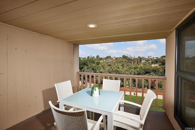 balcony featuring outdoor dining space