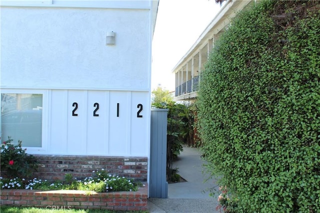 view of property exterior with board and batten siding