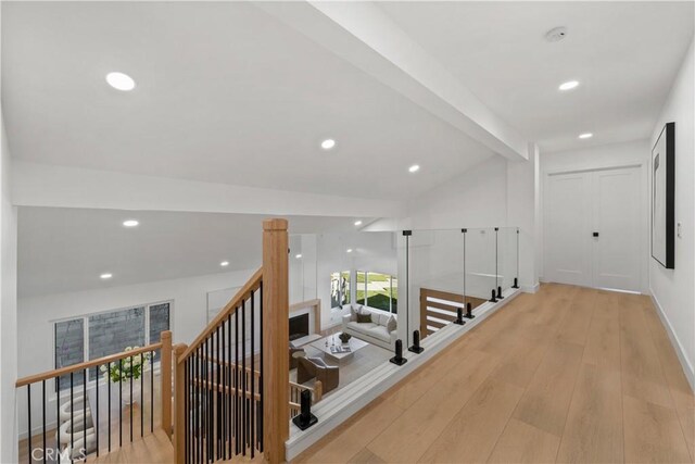 24705 Queens Ct, Laguna Niguel, CA 92677 - hallway featuring wood finished floors, recessed lighting, and an upstairs landing