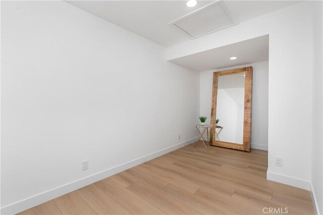 24705 Queens Ct, Laguna Niguel, CA 92677 - spare room featuring baseboards, light wood-style floors, attic access, and recessed lighting