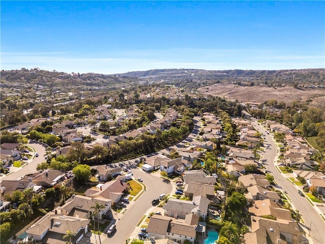 aerial view featuring a residential view and a mountain view