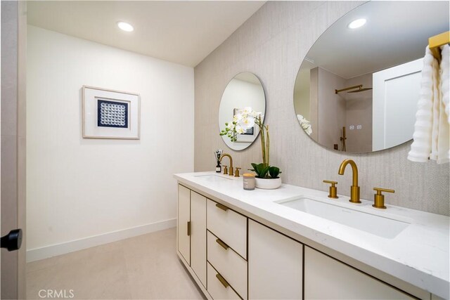 24705 Queens Ct, Laguna Niguel, CA 92677 - bathroom featuring double vanity and recessed lighting