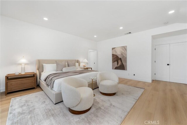 24705 Queens Ct, Laguna Niguel, CA 92677 - bedroom with light wood-style floors, recessed lighting, and baseboards