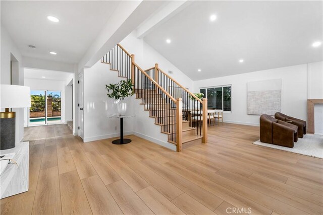 24705 Queens Ct, Laguna Niguel, CA 92677 - staircase featuring wood finished floors, recessed lighting, and baseboards