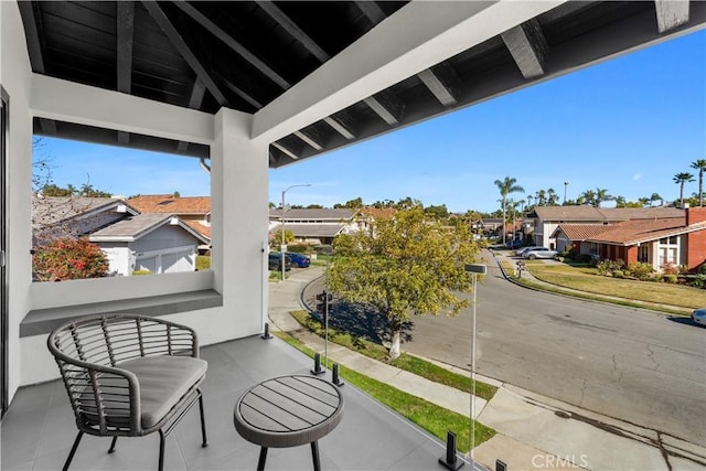 balcony featuring a residential view