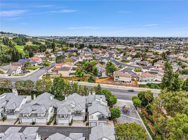 birds eye view of property with a residential view