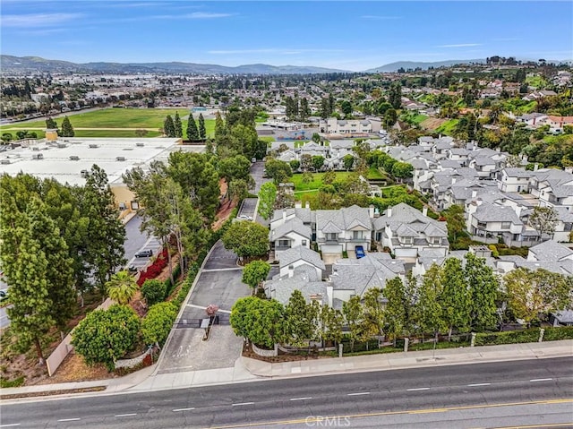bird's eye view featuring a mountain view and a residential view