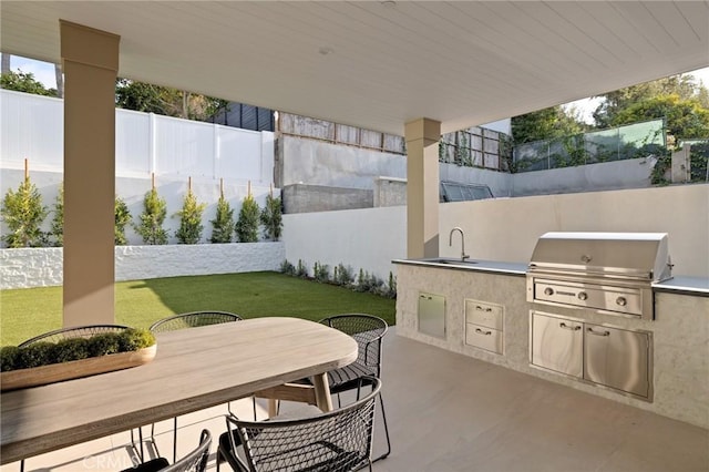 932 9th St, Manhattan Beach, CA 90266 - view of patio with area for grilling, outdoor dining area, and a sink