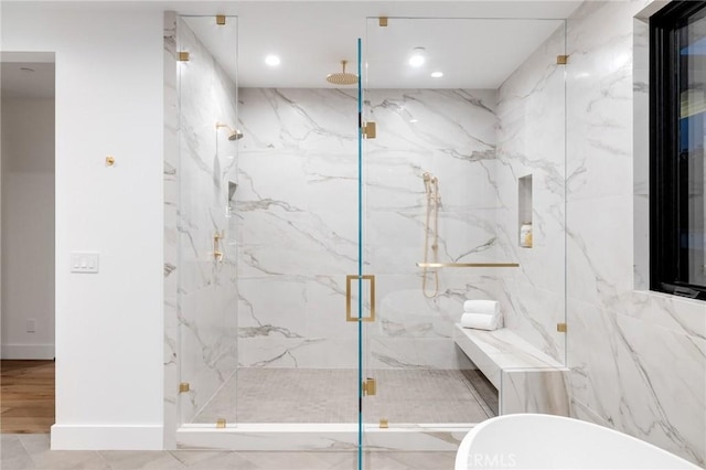 932 9th St, Manhattan Beach, CA 90266 - bathroom with a marble finish shower, a freestanding tub, recessed lighting, and baseboards