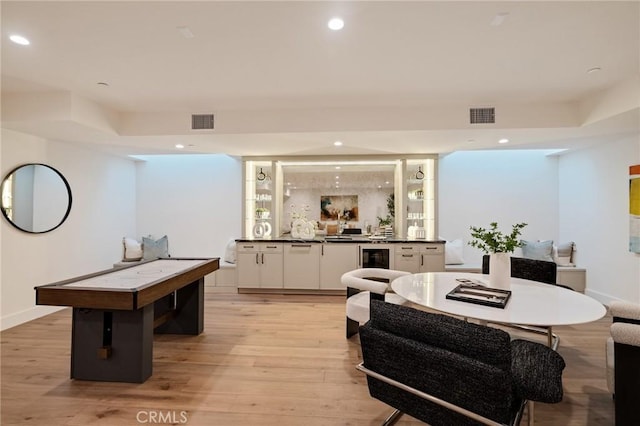 932 9th St, Manhattan Beach, CA 90266 - dining area featuring recessed lighting, light wood finished floors, bar with sink, wine cooler, and baseboards