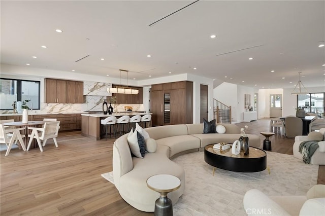 932 9th St, Manhattan Beach, CA 90266 - living room with recessed lighting and light wood-style floors