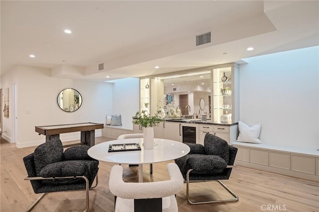 932 9th St, Manhattan Beach, CA 90266 - playroom featuring light wood-style floors, recessed lighting, wet bar, and wine cooler
