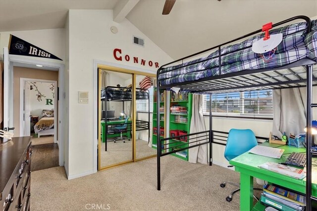 carpeted bedroom with visible vents, a closet, beam ceiling, baseboards, and high vaulted ceiling