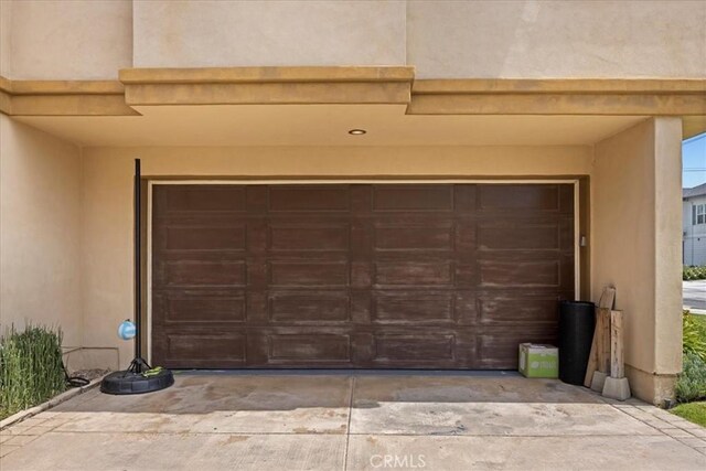 garage with driveway