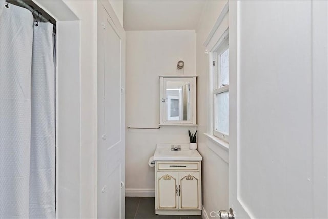 4643 Victoria Ave, Riverside, CA 92507 - bathroom featuring baseboards, curtained shower, tile patterned floors, and vanity