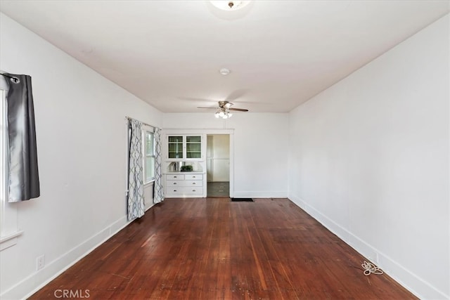 4643 Victoria Ave, Riverside, CA 92507 - spare room with baseboards, ceiling fan, and dark wood-type flooring