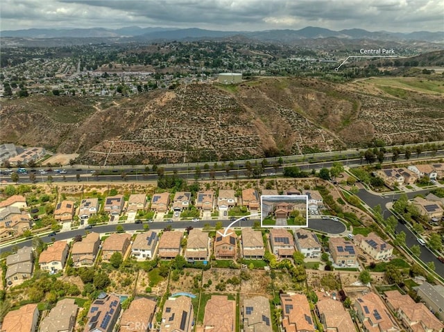 aerial view with a residential view and a mountain view