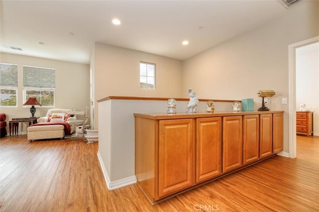 22620 Dragonfly Ct, Saugus, CA 91350 - bar area featuring light wood-type flooring, plenty of natural light, and recessed lighting