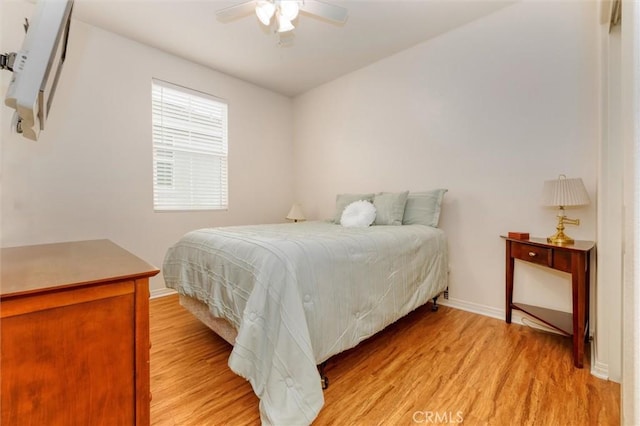 22620 Dragonfly Ct, Saugus, CA 91350 - bedroom with light wood-style floors and a ceiling fan
