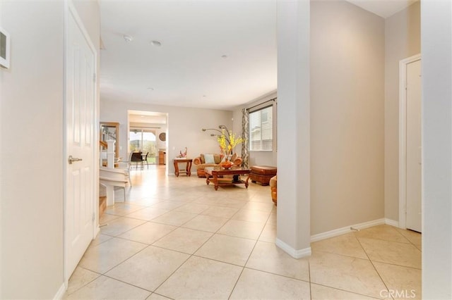 hallway with light tile patterned flooring