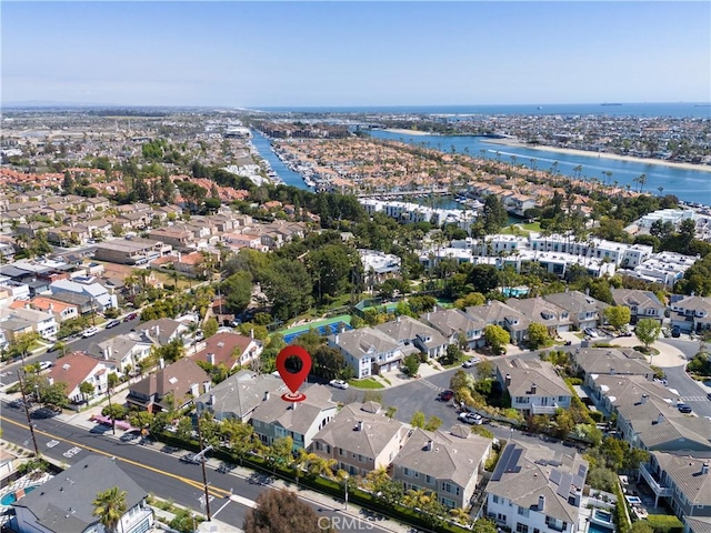 aerial view with a water view and a residential view
