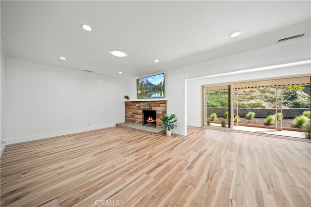 206 Calle De Sirenas, Redondo Beach, CA 90277 - unfurnished living room with baseboards, wood finished floors, recessed lighting, and a stone fireplace