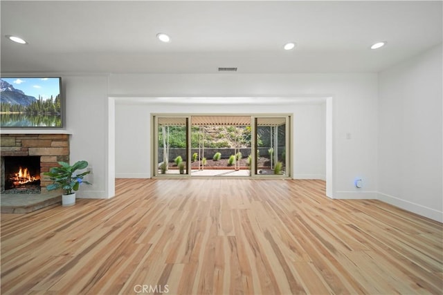206 Calle De Sirenas, Redondo Beach, CA 90277 - unfurnished living room featuring baseboards, a fireplace, wood finished floors, and recessed lighting