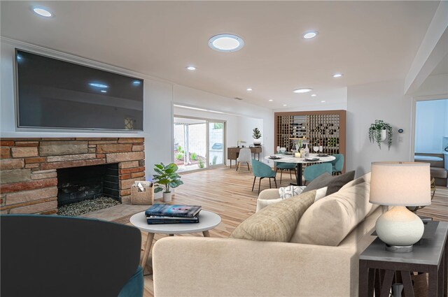 206 Calle De Sirenas, Redondo Beach, CA 90277 - living room with a stone fireplace, light wood finished floors, and recessed lighting