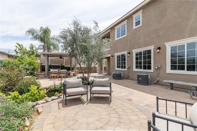 34072 Lily Rd, Yucaipa, CA 92399 - view of patio / terrace with ceiling fan, central AC unit, and outdoor dining space