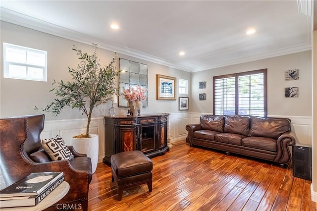 34072 Lily Rd, Yucaipa, CA 92399 - living room with a wainscoted wall, wood-type flooring, crown molding, and a decorative wall