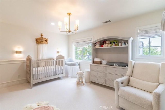 34072 Lily Rd, Yucaipa, CA 92399 - bedroom featuring a chandelier and a crib