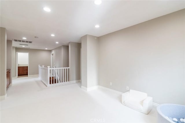34072 Lily Rd, Yucaipa, CA 92399 - empty room featuring recessed lighting, light colored carpet, and baseboards