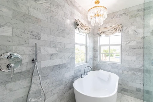 34072 Lily Rd, Yucaipa, CA 92399 - bathroom with a freestanding tub, a chandelier, tile walls, healthy amount of natural light, and a walk in shower