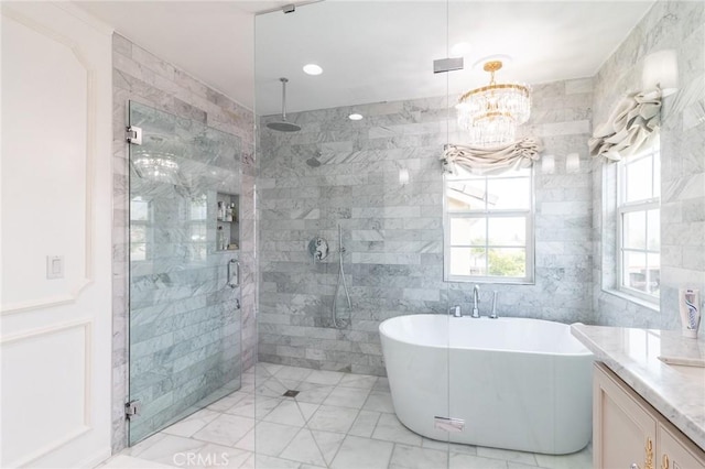 34072 Lily Rd, Yucaipa, CA 92399 - full bathroom featuring a shower stall, a freestanding bath, tile walls, vanity, and a chandelier