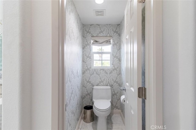 34072 Lily Rd, Yucaipa, CA 92399 - bathroom with wallpapered walls, toilet, and tile patterned floors