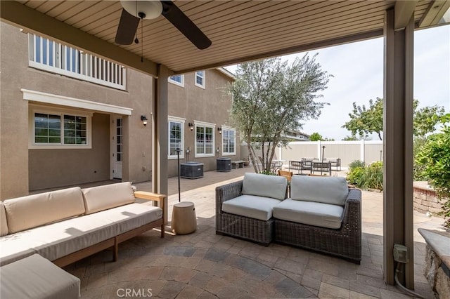 34072 Lily Rd, Yucaipa, CA 92399 - view of patio / terrace with an outdoor living space, fence, ceiling fan, outdoor dining area, and central AC unit