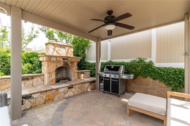 34072 Lily Rd, Yucaipa, CA 92399 - view of patio / terrace with an outdoor stone fireplace, grilling area, and a ceiling fan