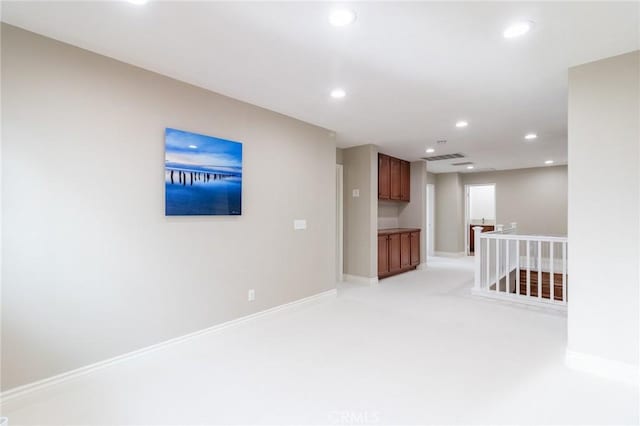 34072 Lily Rd, Yucaipa, CA 92399 - spare room featuring recessed lighting, baseboards, and light carpet