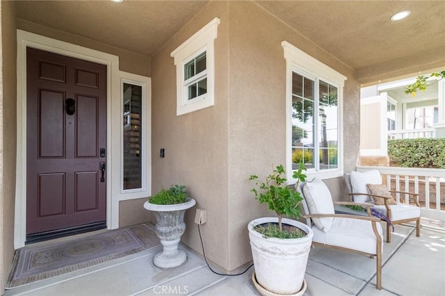 34072 Lily Rd, Yucaipa, CA 92399 - property entrance featuring a porch and stucco siding