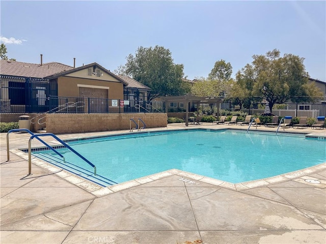 34072 Lily Rd, Yucaipa, CA 92399 - community pool with fence and a patio area