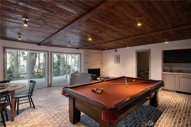 recreation room featuring billiards, wet bar, brick floor, and wooden ceiling