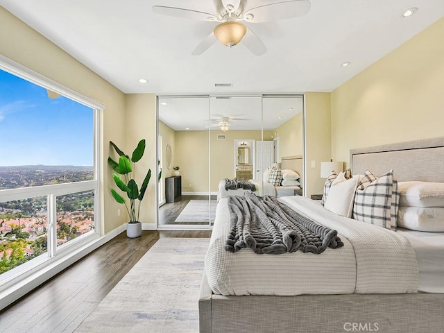 31062 Flying Cloud Dr, Laguna Niguel, CA 92677 - bedroom with a ceiling fan, baseboards, recessed lighting, wood finished floors, and visible vents