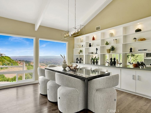 31062 Flying Cloud Dr, Laguna Niguel, CA 92677 - dining area with visible vents, lofted ceiling with beams, wood finished floors, and a healthy amount of sunlight